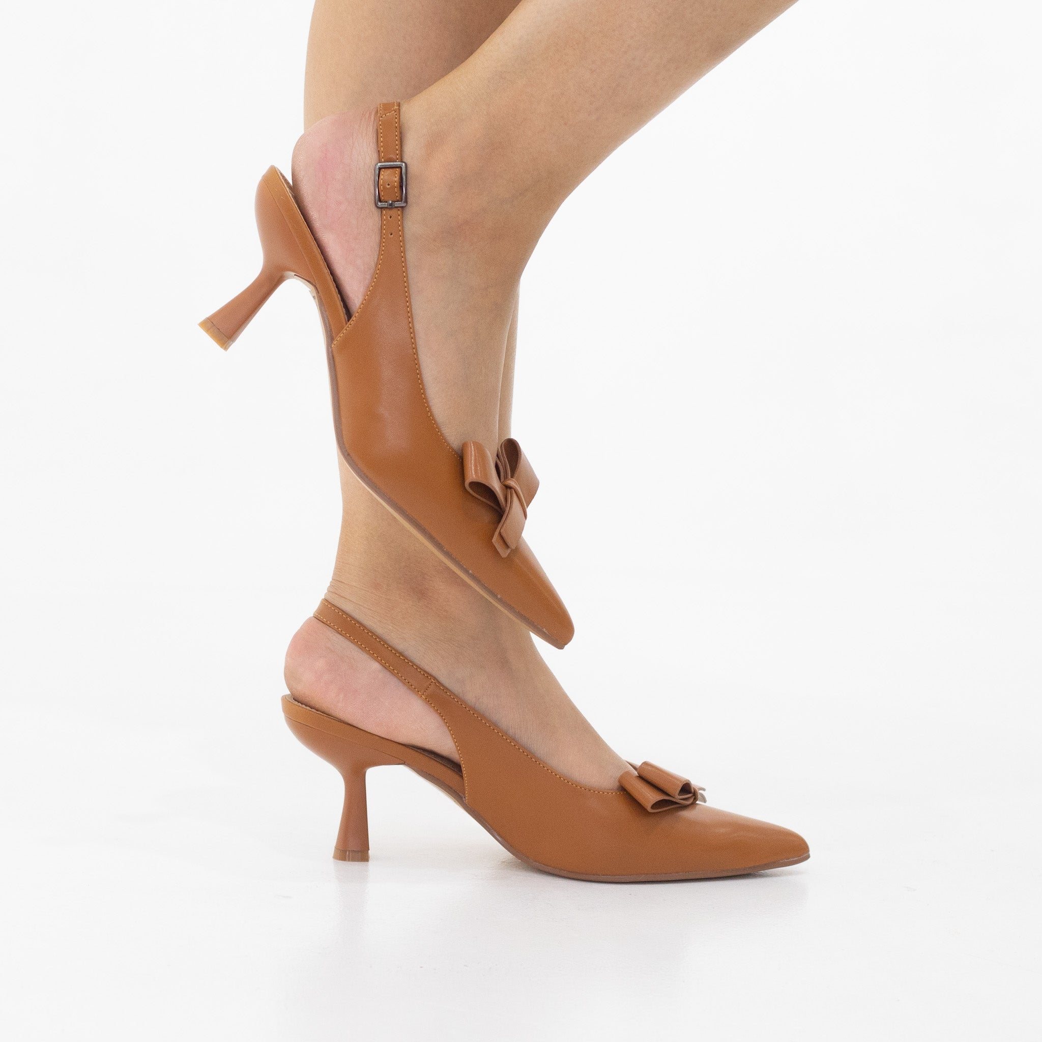 Rejaf pointy patent sling back courts with knot trim on 7cm heel