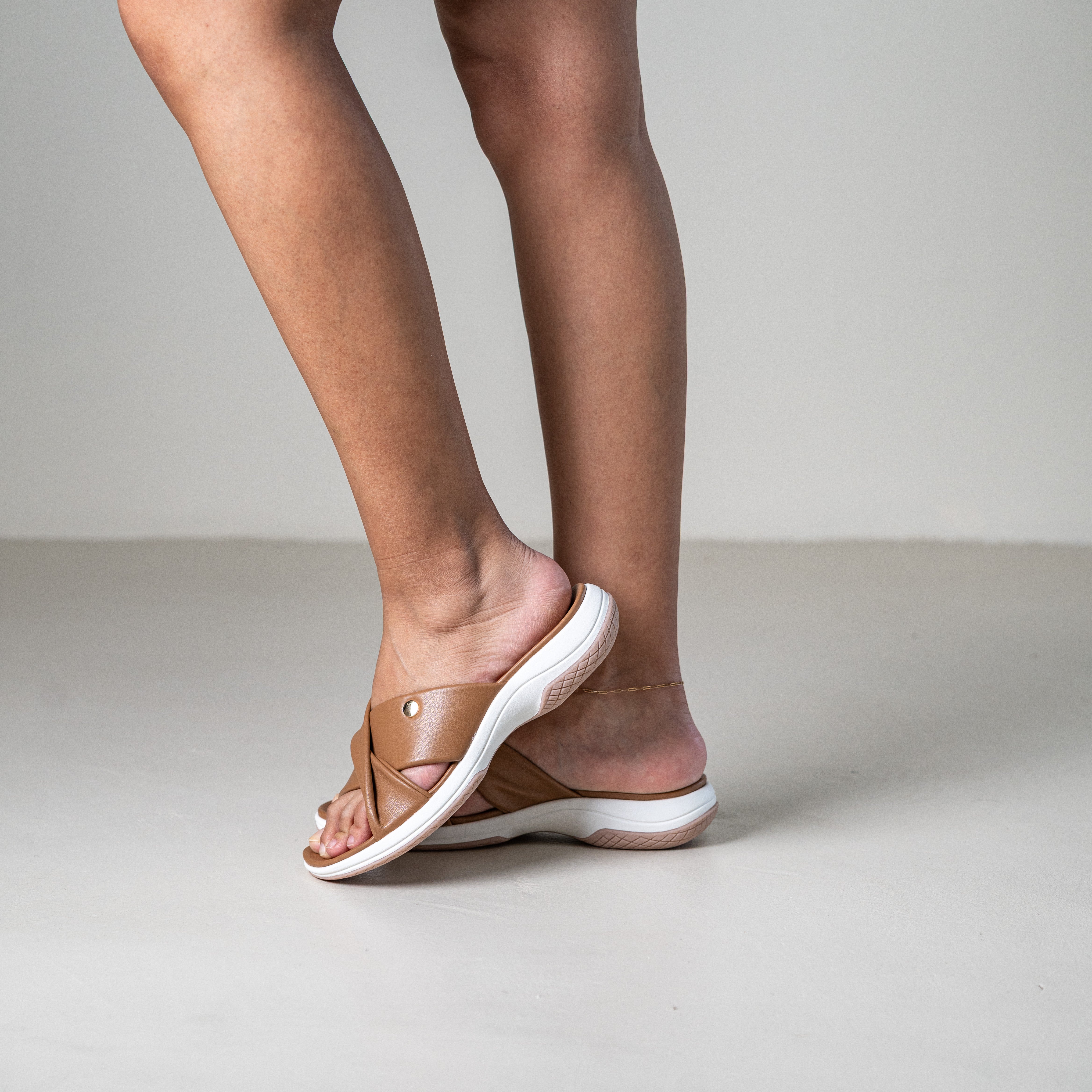 Tizzy cross-strap slide sandals with studs