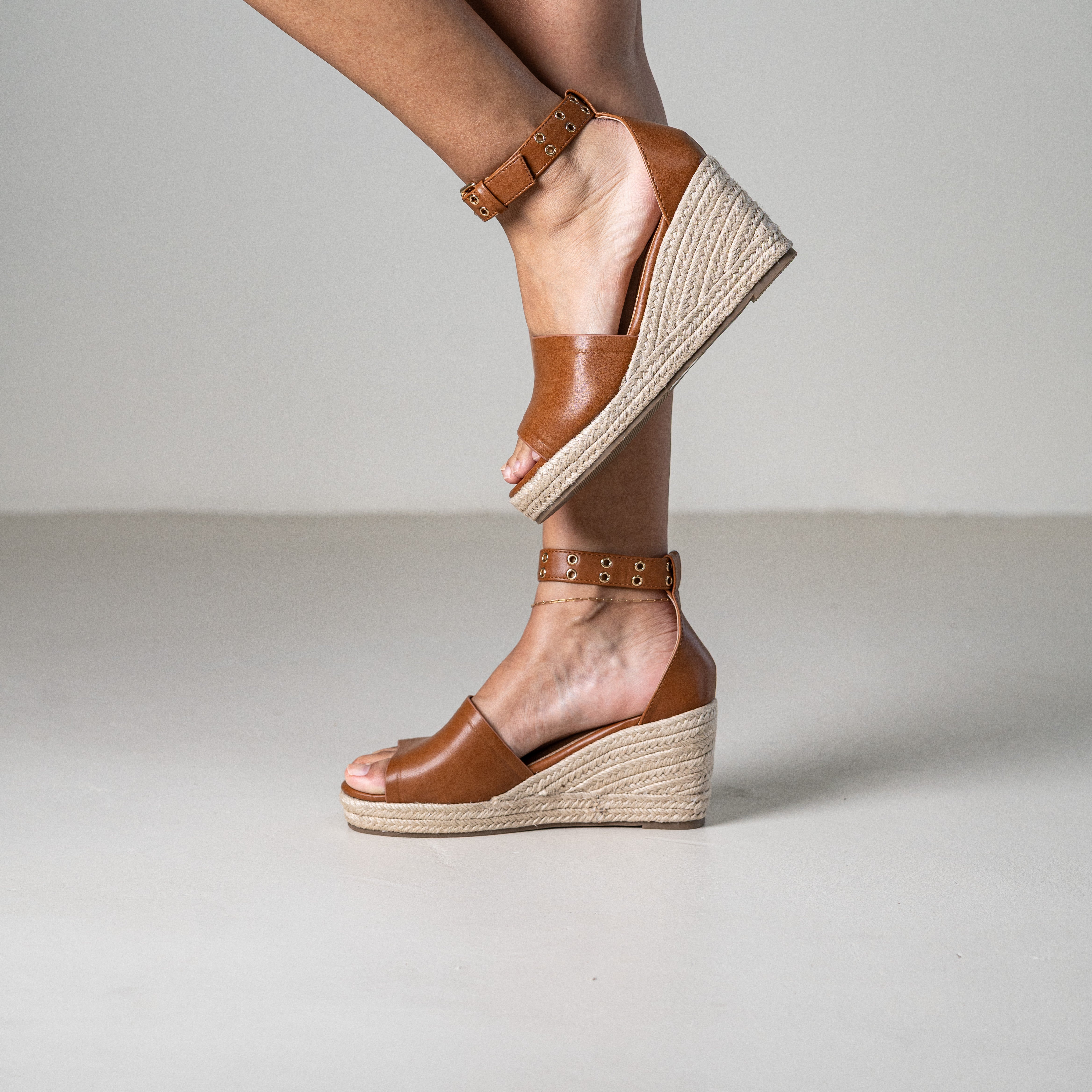 Mitohi wedge sandals with ankle strap and open toe