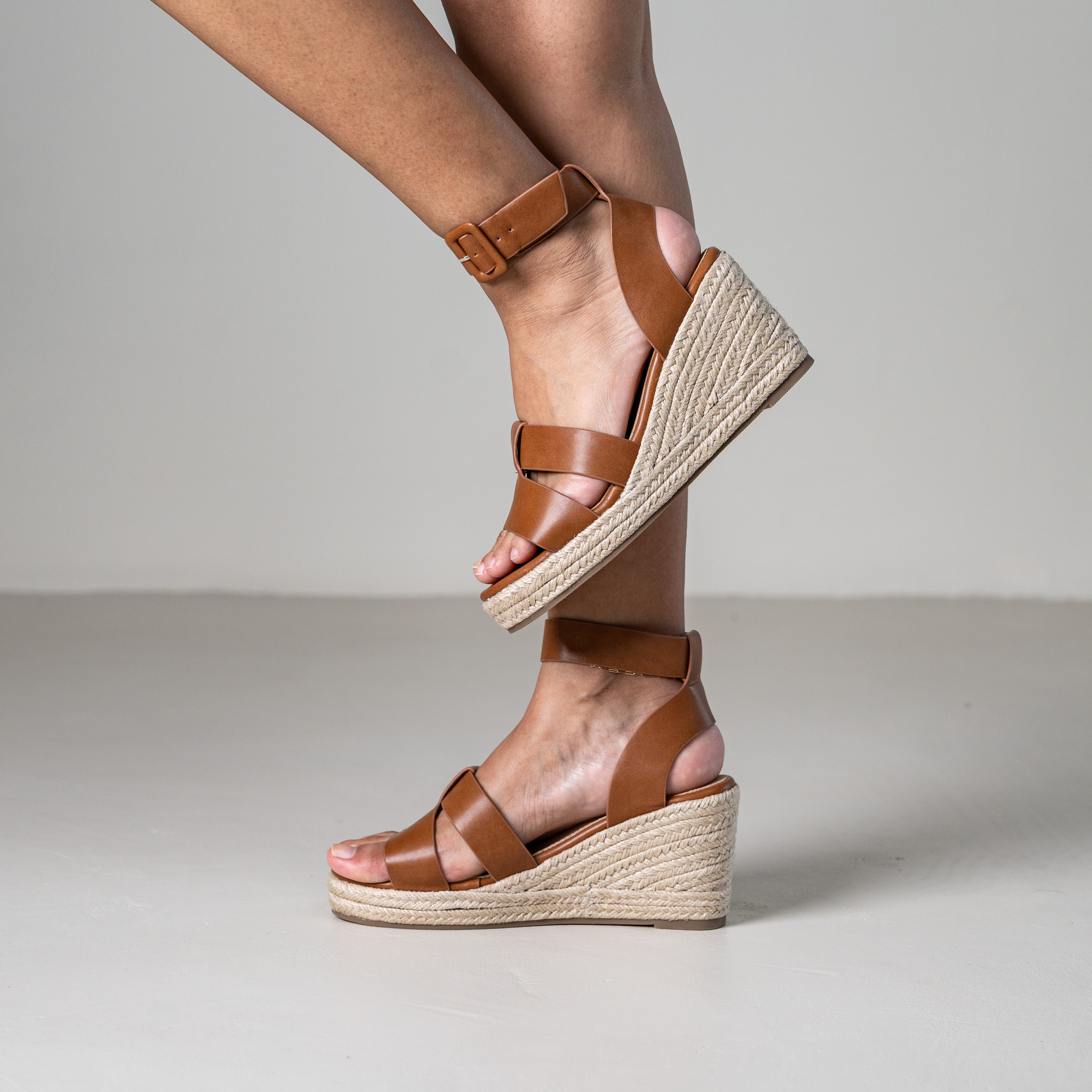 Tohima wedge sandals with crisscross straps and ankle strap