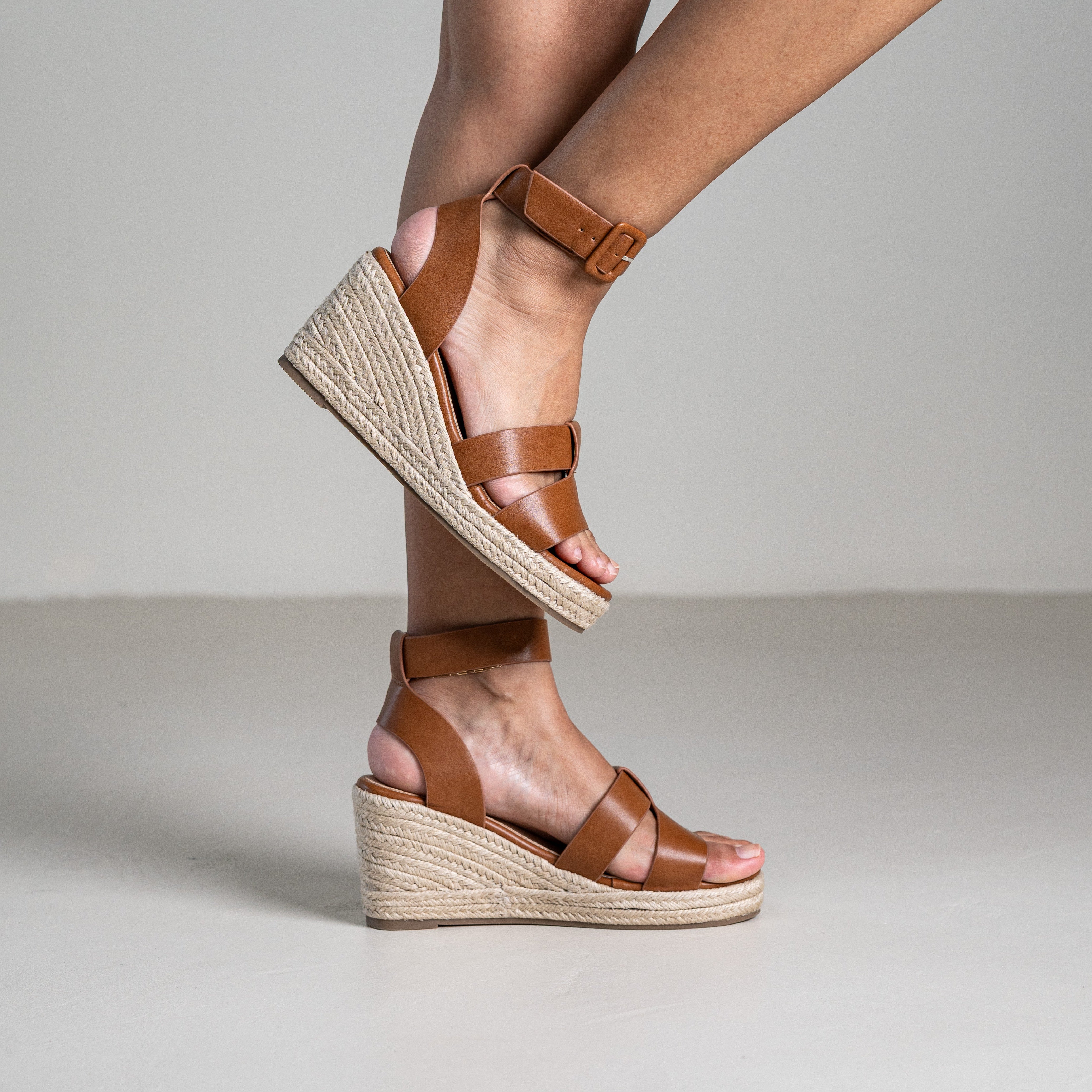 Tohima wedge sandals with crisscross straps and ankle strap
