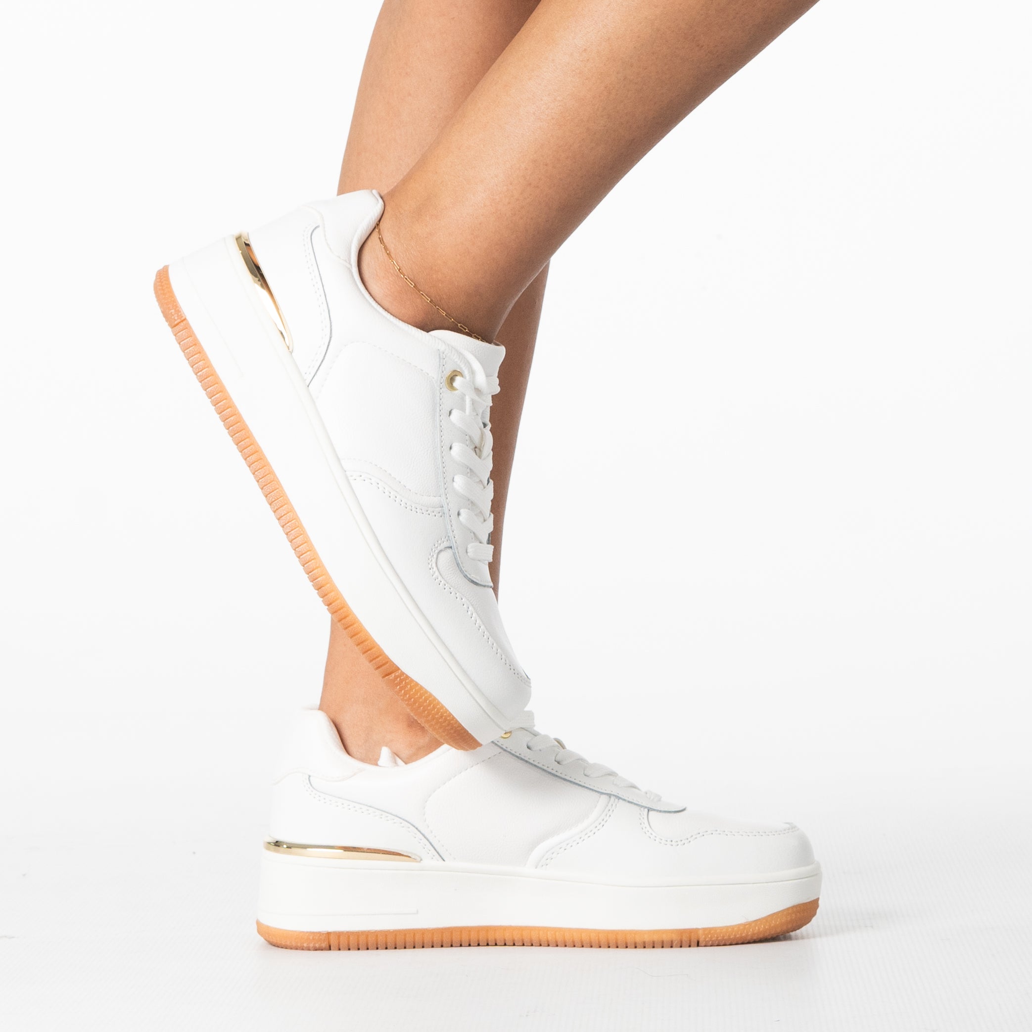 Margot women's sleek sneaker with gold accent detail