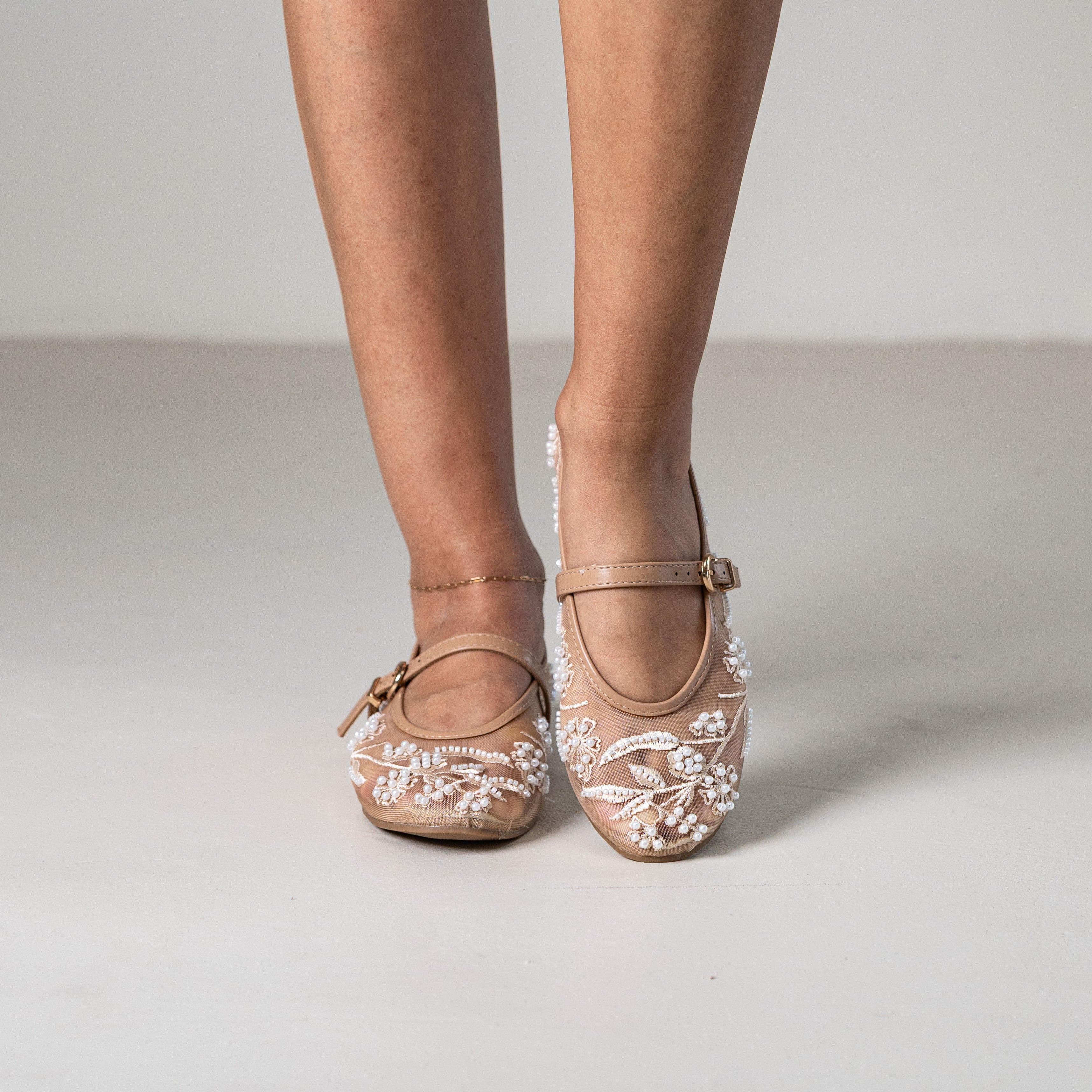 Petal beaded floral pump with strap and embellishments