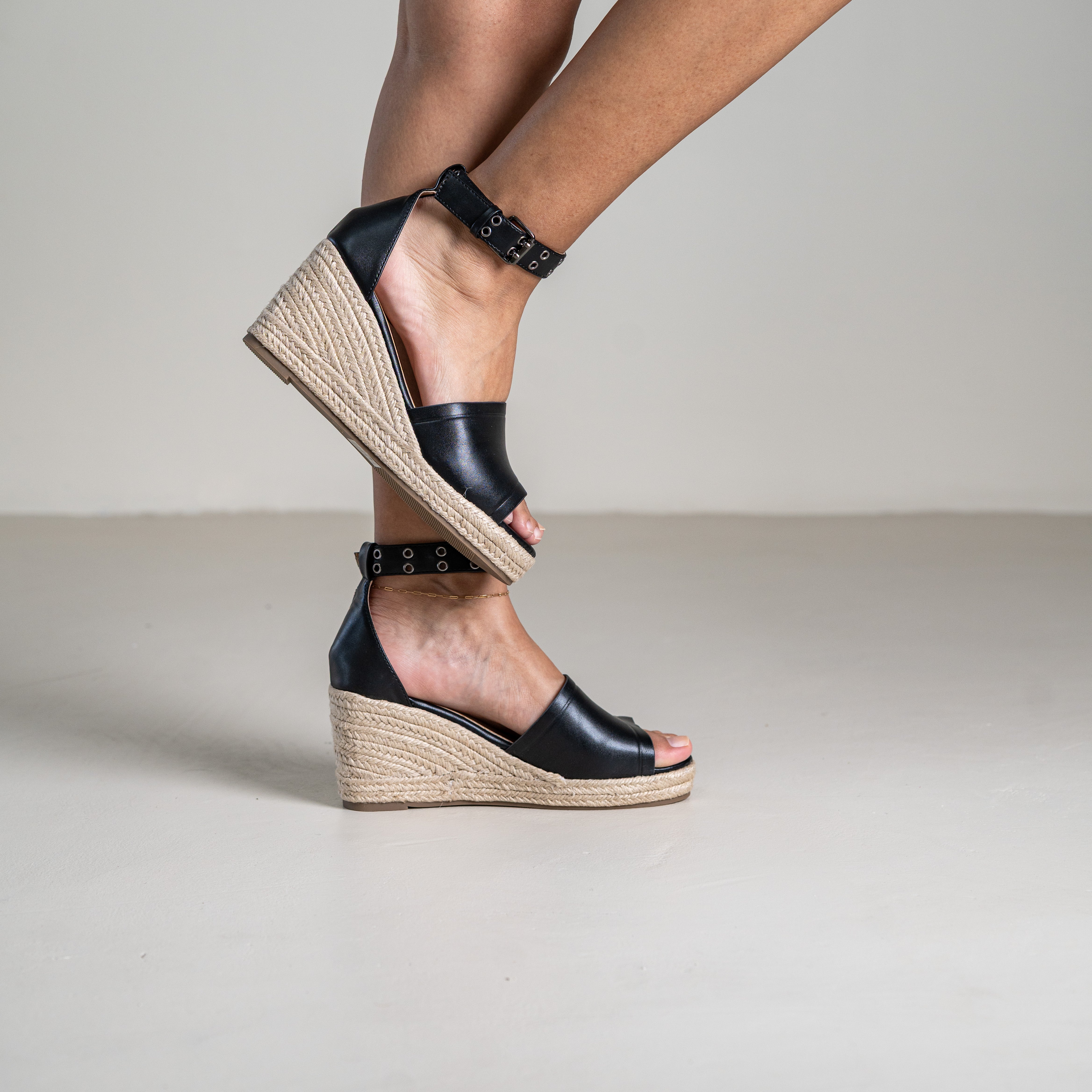 Mitohi wedge sandals with ankle strap and open toe
