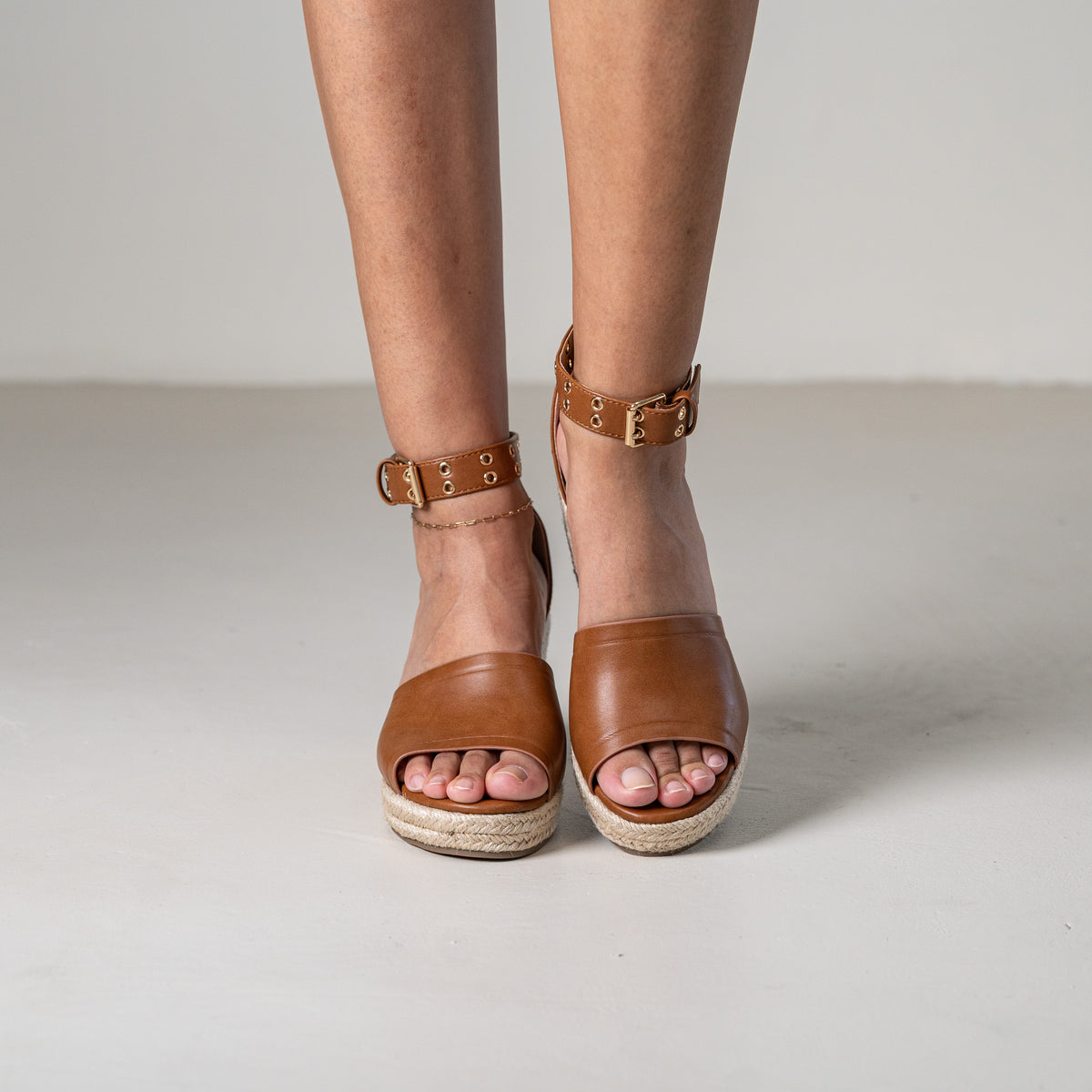 Mitohi wedge sandals with ankle strap and open toe