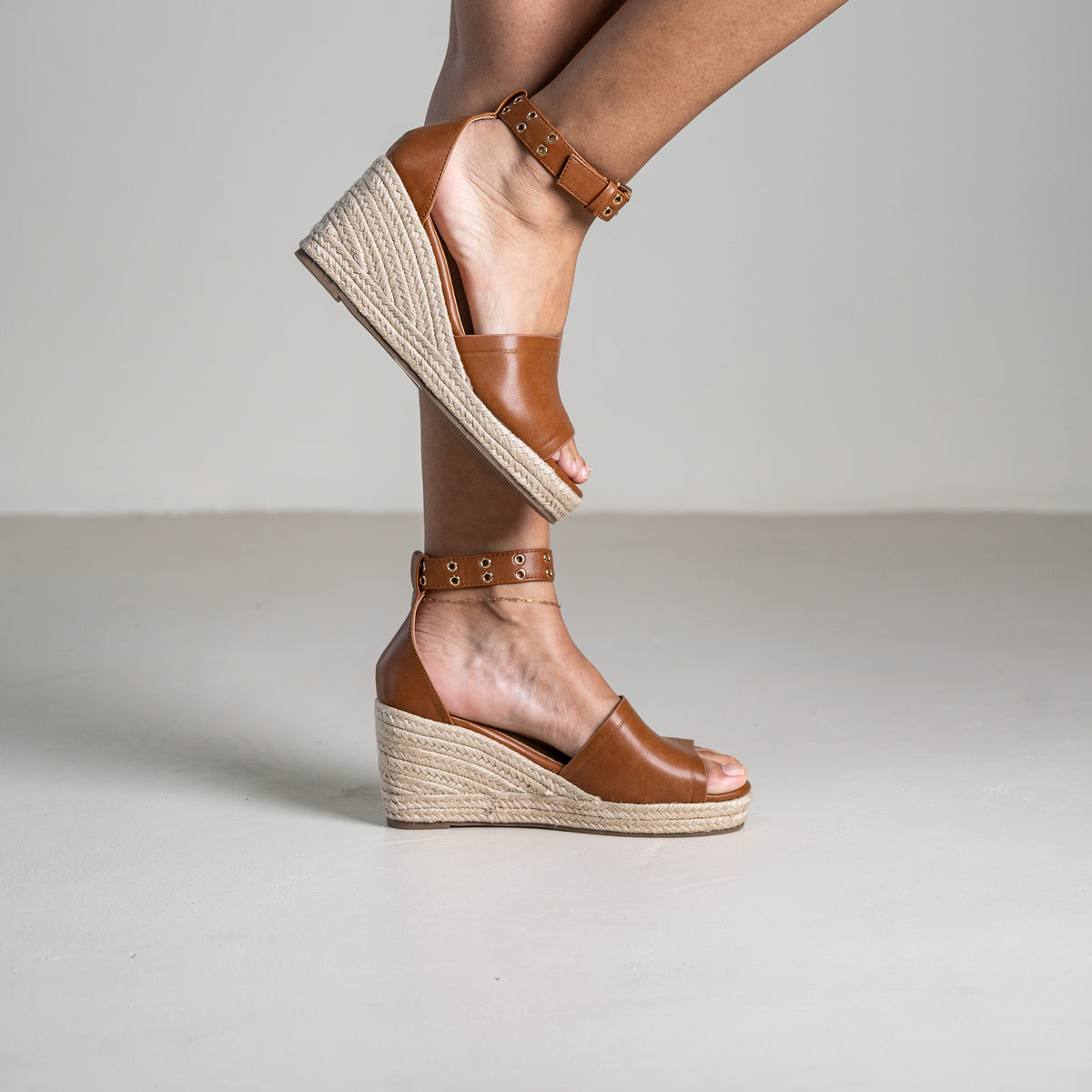 Mitohi wedge sandals with ankle strap and open toe