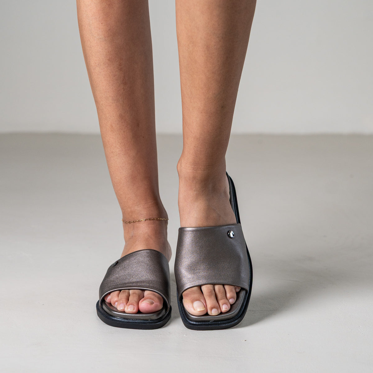 Marley slip-on sandal with front metal stud