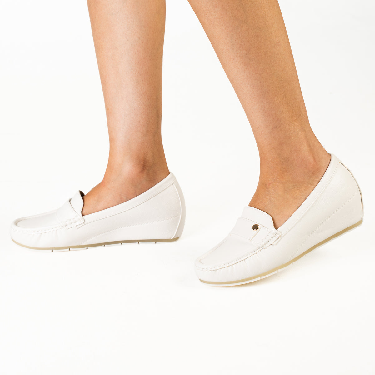 Plasma women's white loafers with elegant strap detailing and comfortable soles.