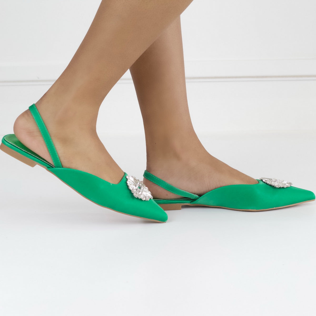 Erina pointy sling back pump with a trim green