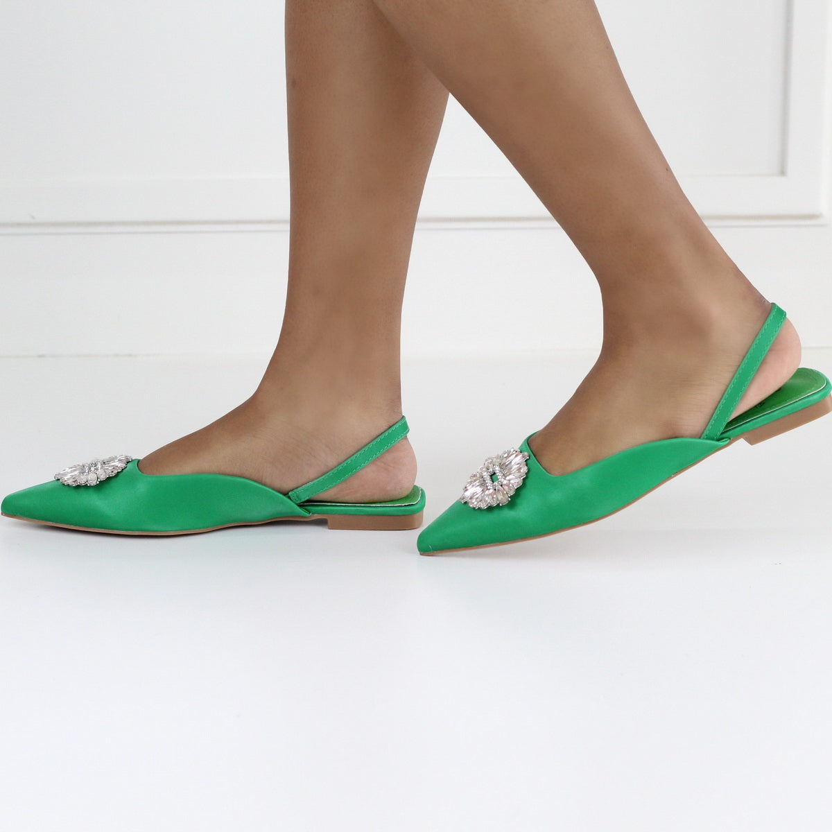 Erina pointy sling back pump with a trim green