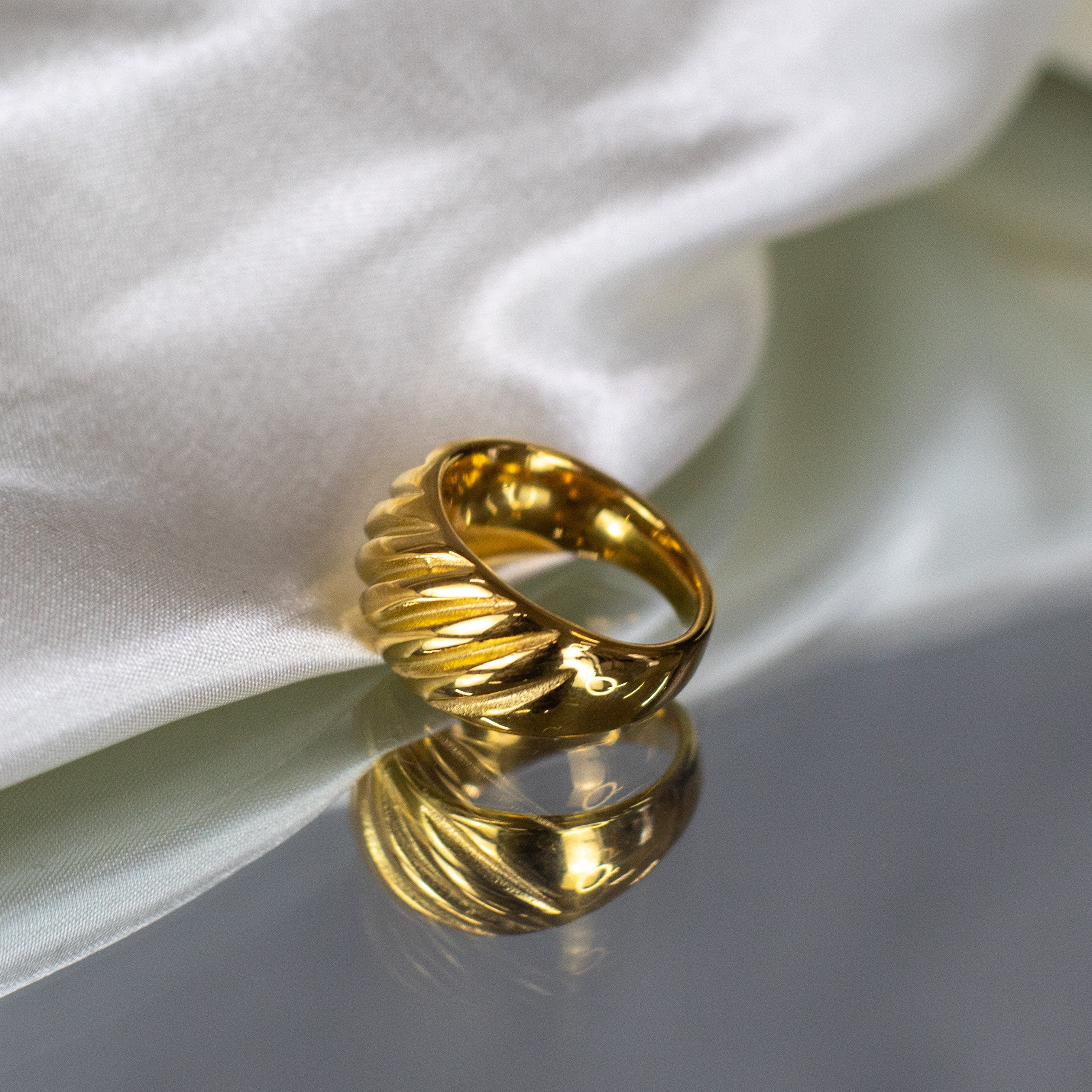 Eloise gold earrings with an eye for vintage