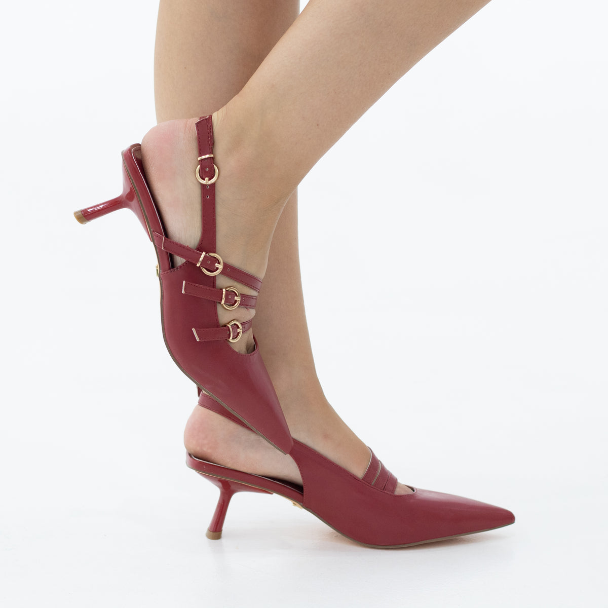 Hilma pointy sling back on a 4cm heel with a twist of side buckles fin