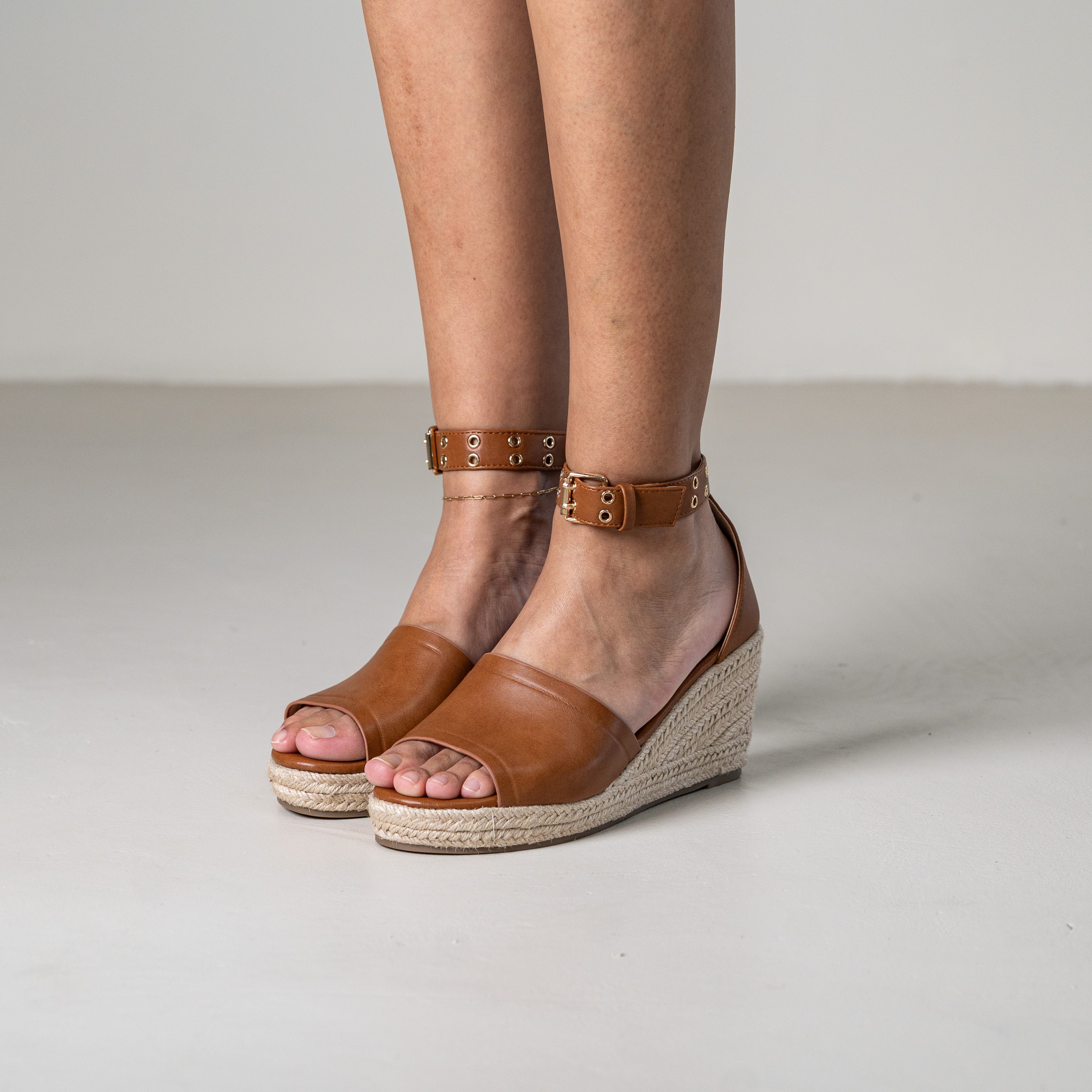 Mitohi wedge sandals with ankle strap and open toe