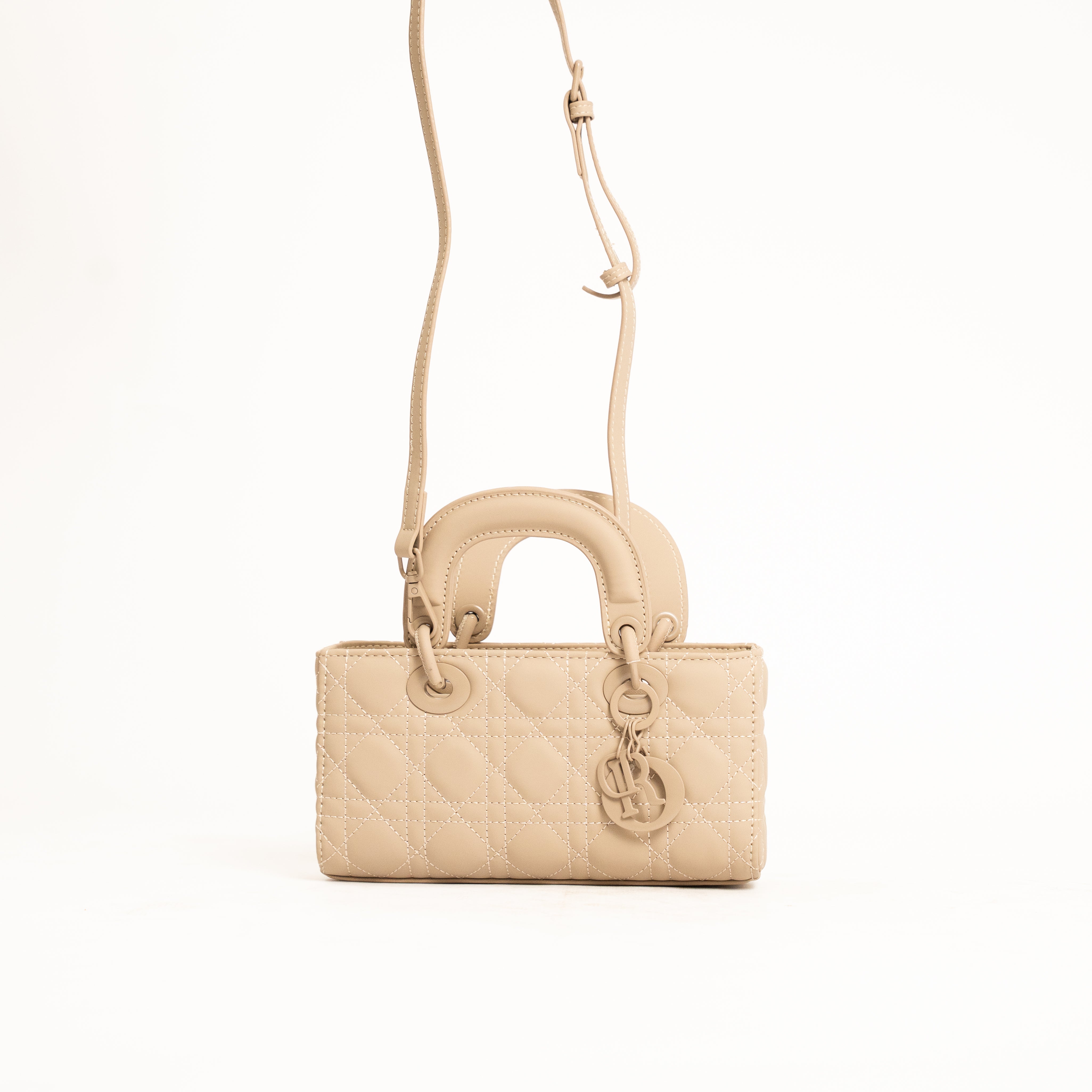 Revia elegant quilted mini top-handle crossbody bag