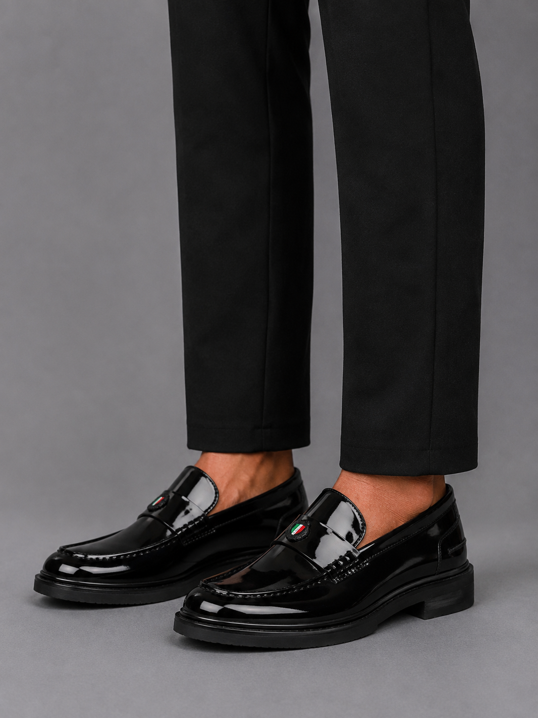 Mazerata Elia11 Glossy black patent loafers with sleek Italian detailing