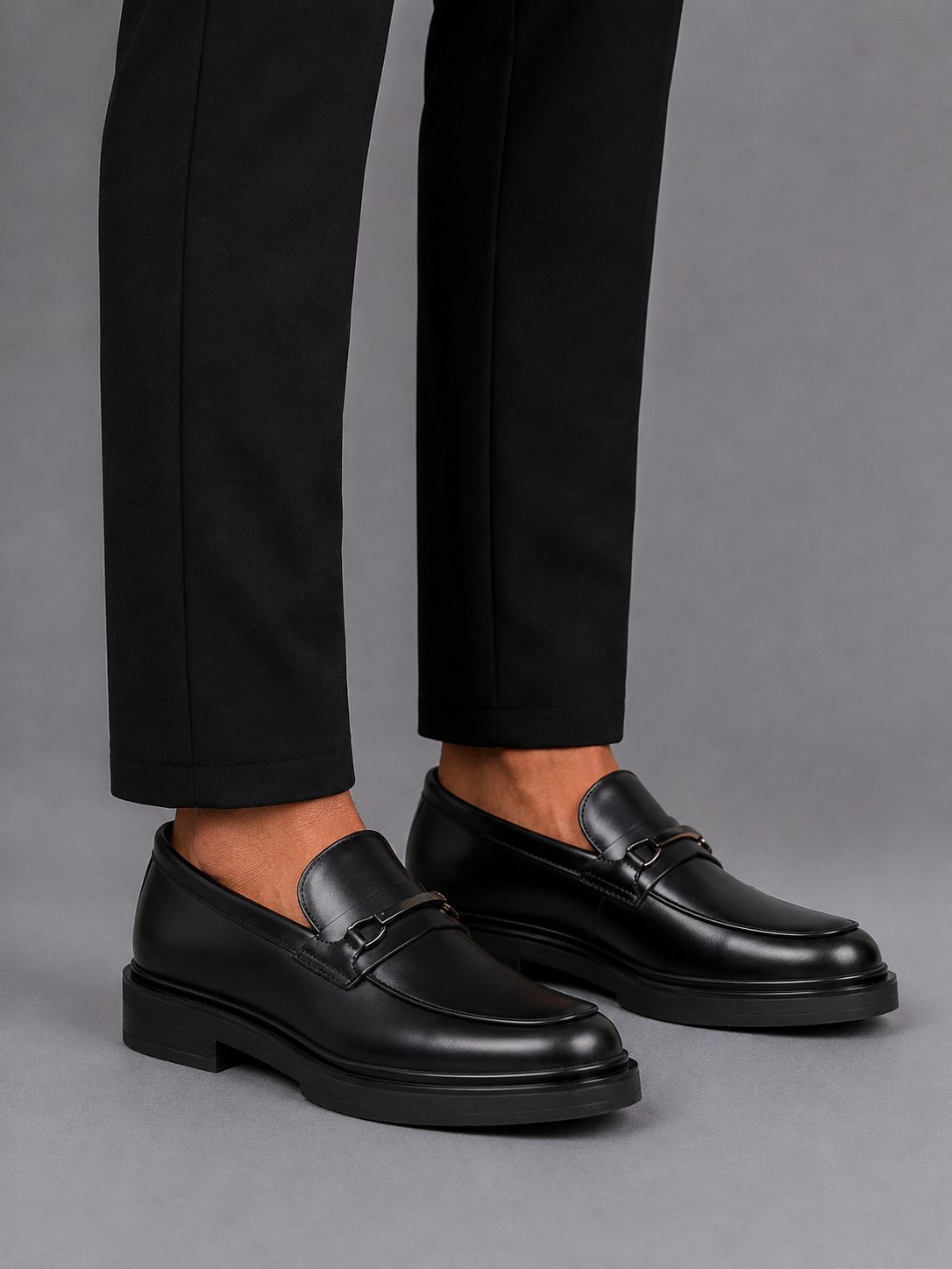 Mazerata Elia17 polished black loafer with sleek metal detail