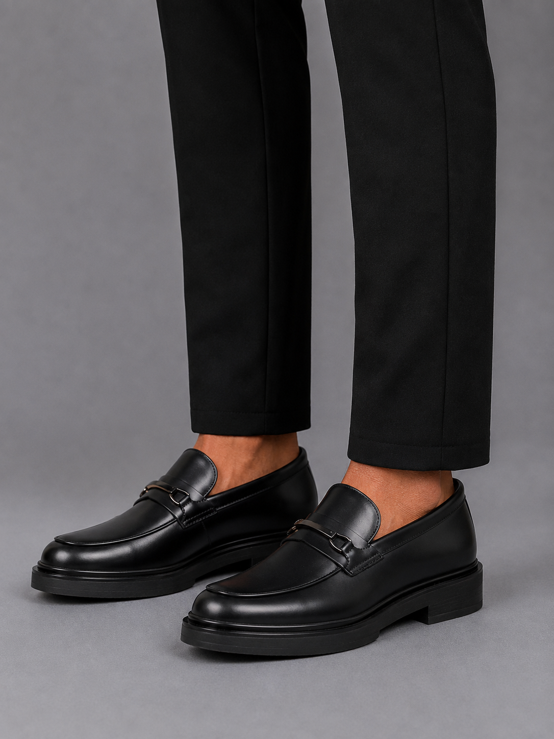 Mazerata Elia17 polished black loafer with sleek metal detail