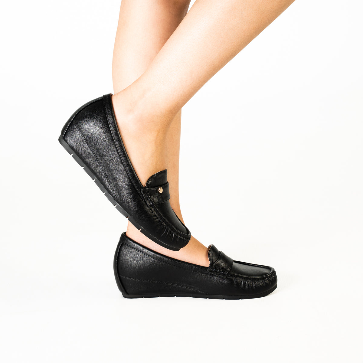 Plasma women's white loafers with elegant strap detailing and comfortable soles.