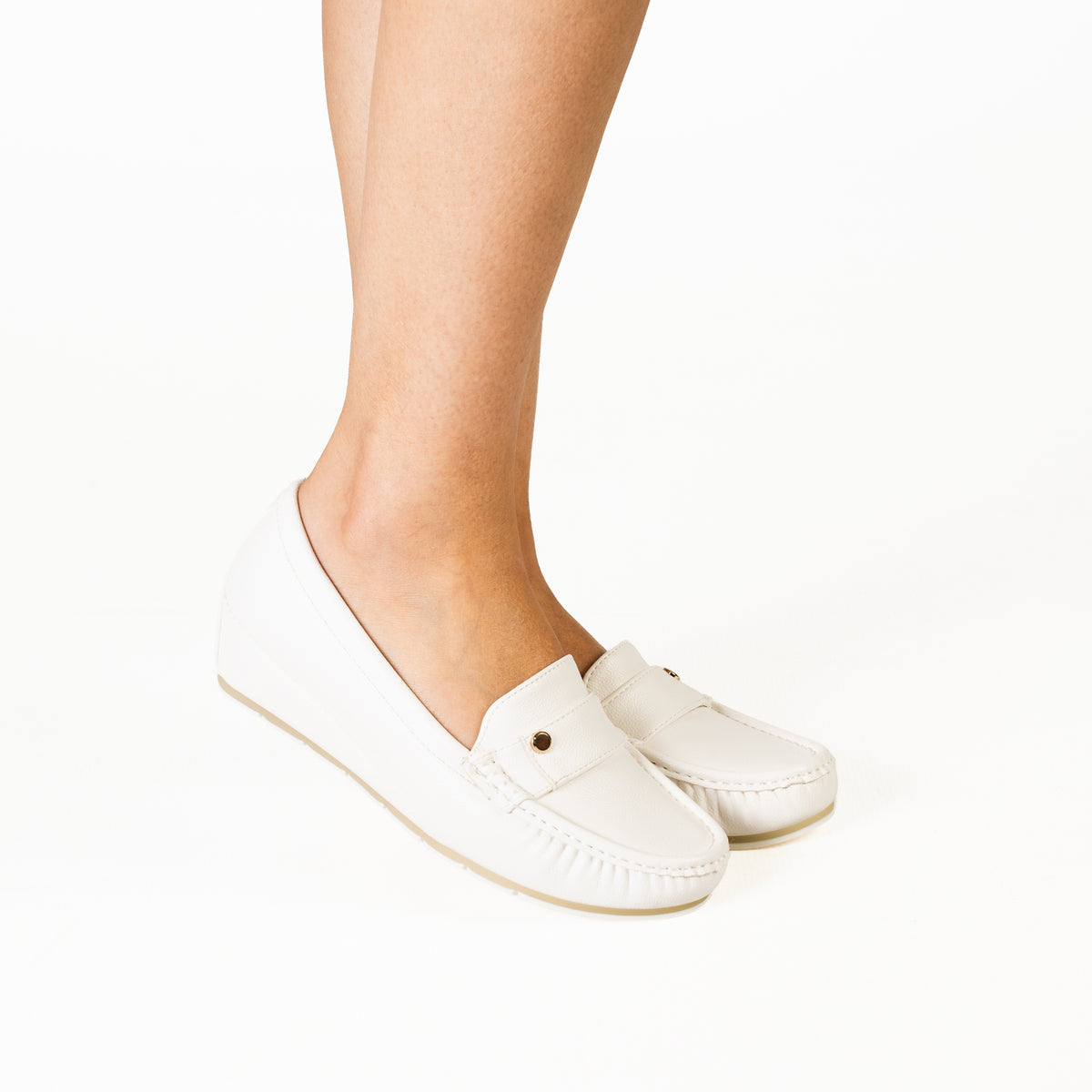 Plasma women's white loafers with elegant strap detailing and comfortable soles.