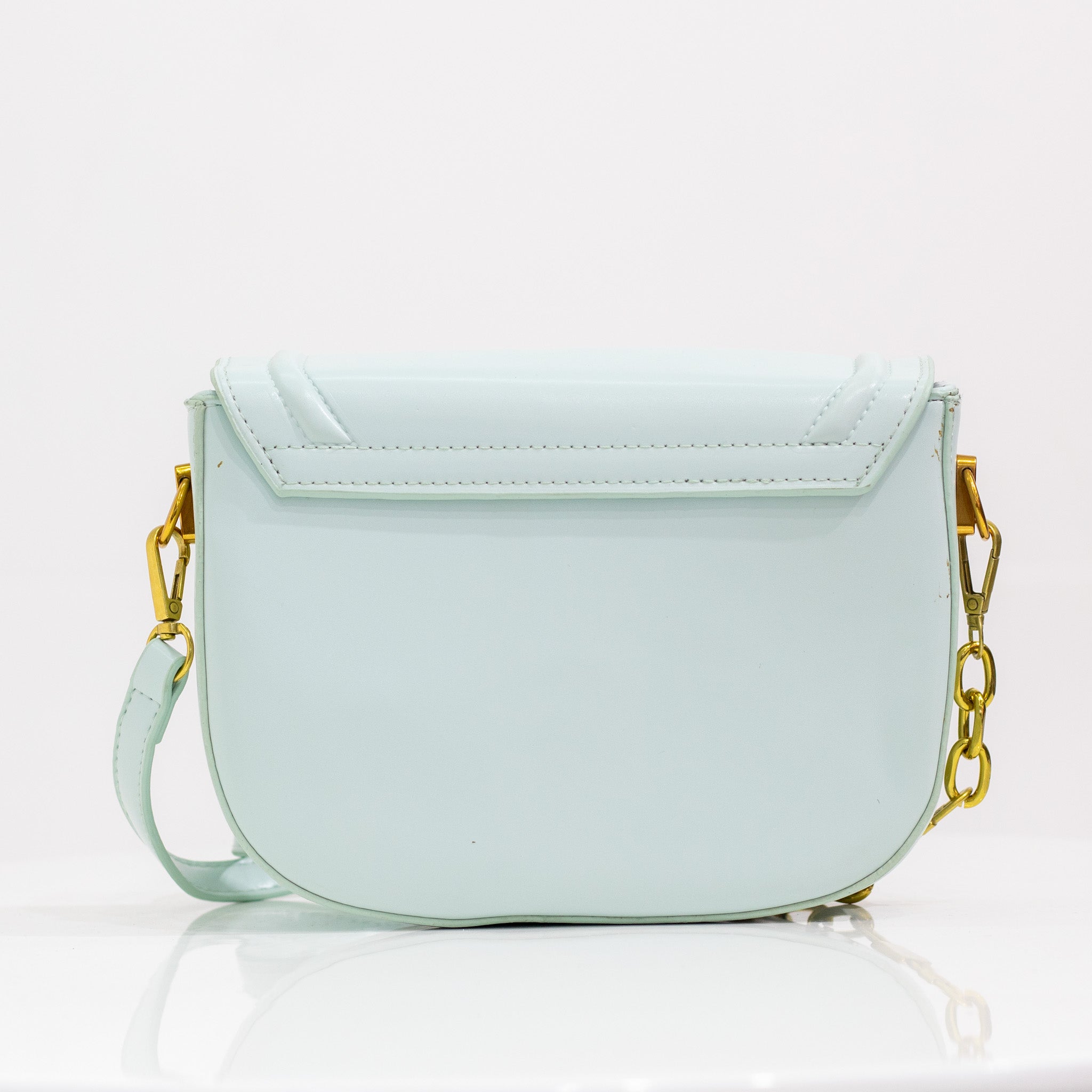 Quentin faux leather saddle bag light blue