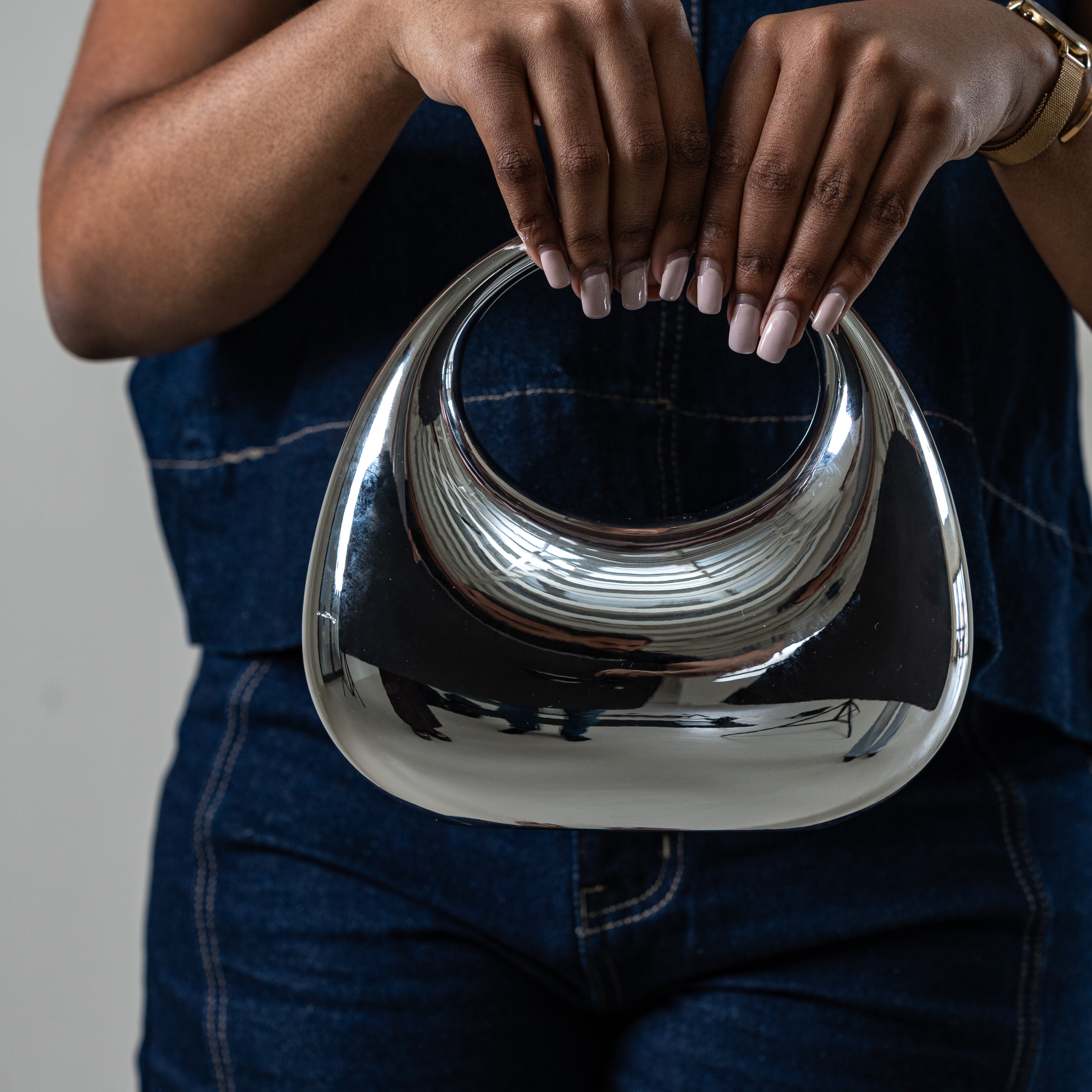 Bornite oval evening bag with top handle